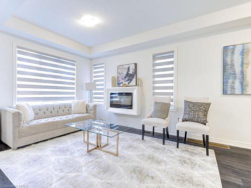 41 Trailbank Gardens, Waterdown, ON - Indoor Photo Showing Living Room With Fireplace