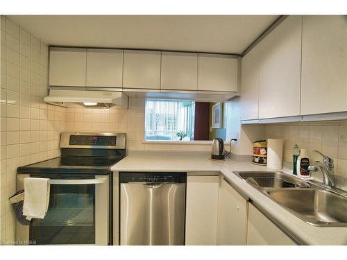 903-75 King Street E, Mississauga, ON - Indoor Photo Showing Kitchen With Double Sink