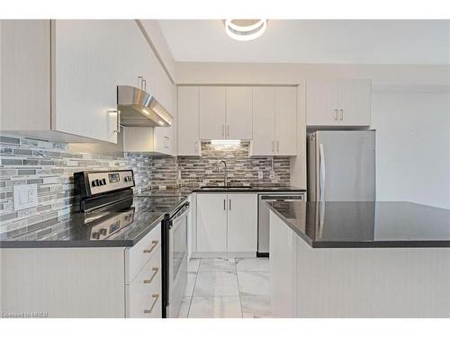 510-2486 Old Bronte Road Road, Oakville, ON - Indoor Photo Showing Kitchen With Stainless Steel Kitchen With Double Sink With Upgraded Kitchen