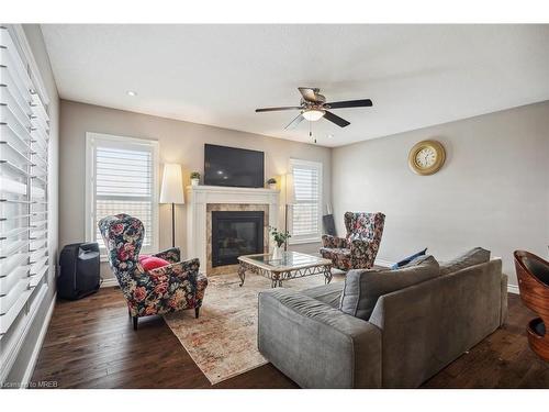 14 Moffatt Avenue, Ingersoll, ON - Indoor Photo Showing Living Room With Fireplace