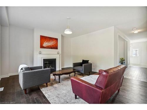 39 Tulip Crescent, Simcoe, ON - Indoor Photo Showing Living Room With Fireplace