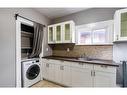 Upper-25 Spadina Avenue, Hamilton, ON  - Indoor Photo Showing Laundry Room 