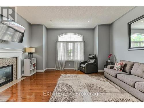 317 Sienna Crescent, Kitchener, ON - Indoor Photo Showing Living Room With Fireplace