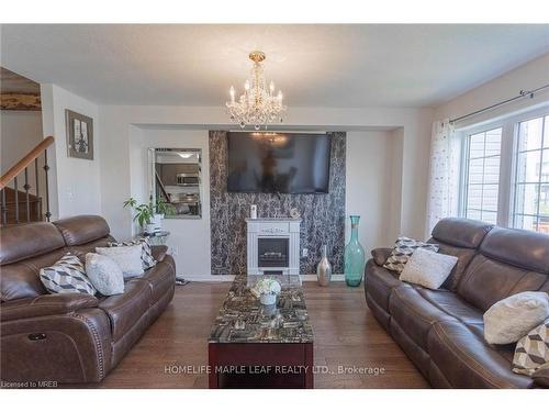 3 Cooke Avenue, Brantford, ON - Indoor Photo Showing Living Room With Fireplace