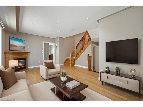 7173 Village Walk, Mississauga, ON - Indoor Photo Showing Living Room With Fireplace