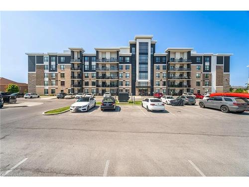 110-650 Sauve Street, Milton, ON - Outdoor With Balcony With Facade