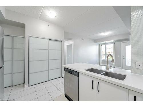 110-650 Sauve Street, Milton, ON - Indoor Photo Showing Kitchen With Double Sink