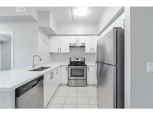 110-650 Sauve Street, Milton, ON - Indoor Photo Showing Kitchen With Double Sink With Upgraded Kitchen