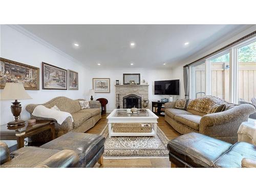 25 Cluster Oak Place, Brampton, ON - Indoor Photo Showing Living Room With Fireplace