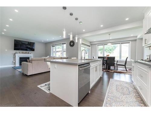 124 Drexler Avenue, Wellington, ON - Indoor Photo Showing Kitchen With Fireplace With Upgraded Kitchen