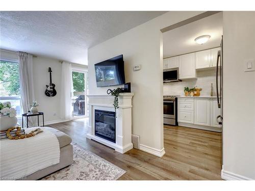 187 Ironstone Drive, Cambridge, ON - Indoor Photo Showing Living Room With Fireplace