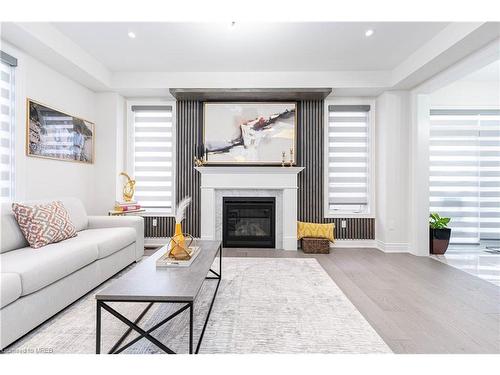 3 Grierson Trail, Waterdown, ON - Indoor Photo Showing Living Room With Fireplace