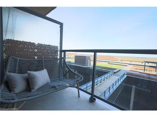 309-560 North Service Road, Grimsby, ON - Outdoor With Body Of Water With Balcony With View With Exterior