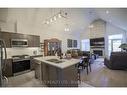 7-63 Compass Trail, Port Stanley, ON  - Indoor Photo Showing Kitchen With Fireplace With Double Sink With Upgraded Kitchen 