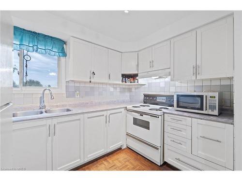 76-77 Collins Crescent, Brampton, ON - Indoor Photo Showing Kitchen With Double Sink