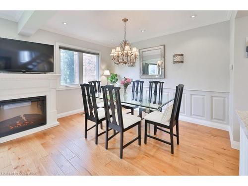 3527 Ash Row Crescent, Peel, ON - Indoor Photo Showing Dining Room With Fireplace