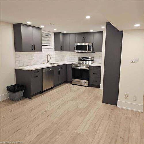 5552 Bourget Drive, Mississauga, ON - Indoor Photo Showing Kitchen With Double Sink