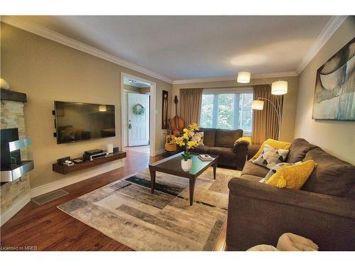 49-1050 Shawnmarr Road, Mississauga, ON - Indoor Photo Showing Living Room With Fireplace