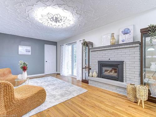 568 Canewood Crescent, Waterloo, ON - Indoor Photo Showing Living Room With Fireplace