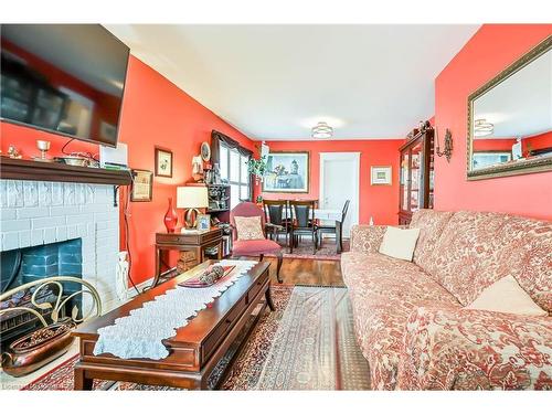 34 Craigmiller Avenue, Hamilton, ON - Indoor Photo Showing Living Room With Fireplace