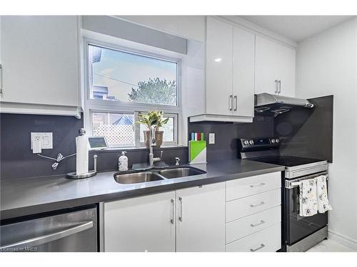 25 Boustead Avenue, Toronto, ON - Indoor Photo Showing Kitchen With Double Sink