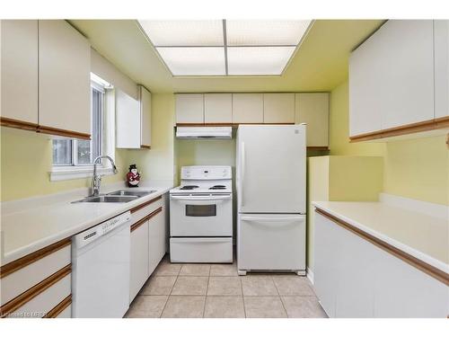 202-880 Dundas Street, Mississauga, ON - Indoor Photo Showing Kitchen With Double Sink