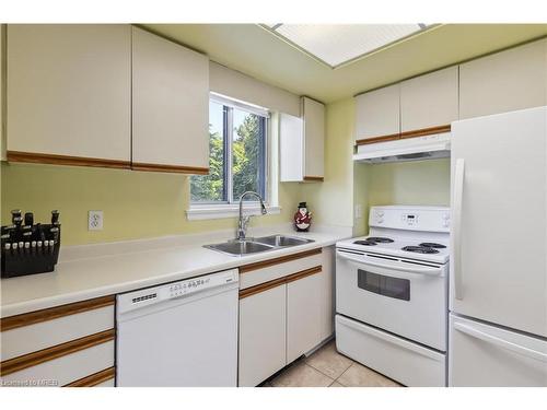 202-880 Dundas Street, Mississauga, ON - Indoor Photo Showing Kitchen With Double Sink