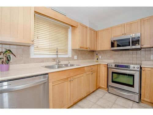 64 Westland Street, St. Catharines, ON - Indoor Photo Showing Kitchen With Double Sink