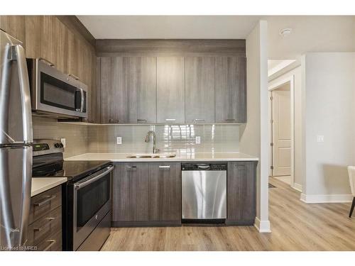 805-150 Main Street West, Hamilton, ON - Indoor Photo Showing Kitchen With Double Sink With Upgraded Kitchen