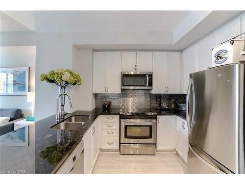 220-80 Port Street, Mississauga, ON - Indoor Photo Showing Kitchen With Double Sink