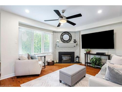 35 Treanor Crescent, Georgetown, ON - Indoor Photo Showing Living Room With Fireplace