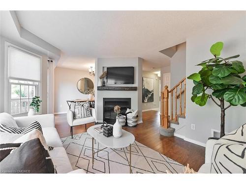 25-2935 Headon Forest Drive, Burlington, ON - Indoor Photo Showing Living Room With Fireplace