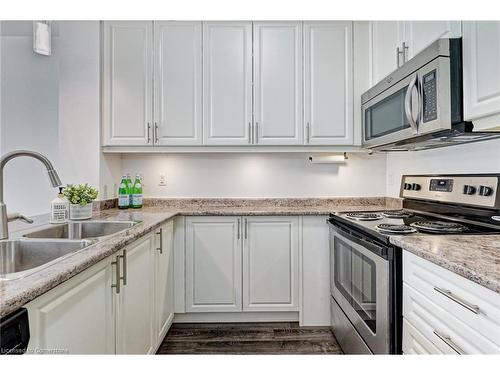 111-35 Southshore Crescent, Hamilton, ON - Indoor Photo Showing Kitchen With Double Sink With Upgraded Kitchen