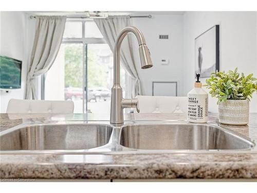 111-35 Southshore Crescent, Hamilton, ON - Indoor Photo Showing Kitchen With Double Sink