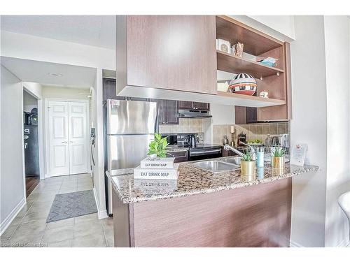 412-2365 Central Park Drive, Oakville, ON - Indoor Photo Showing Kitchen With Double Sink