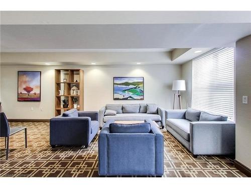 310-77 Mcmurrich Street, Toronto, ON - Indoor Photo Showing Living Room