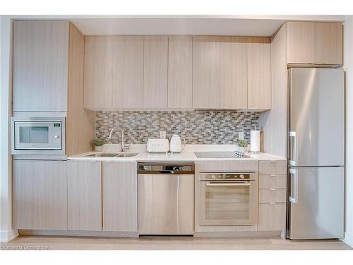 A527-5230 Dundas Street, Burlington, ON - Indoor Photo Showing Kitchen With Stainless Steel Kitchen