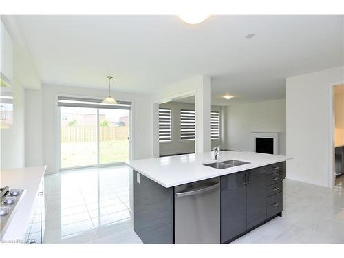 102 Rugman Crescent, Springwater, ON - Indoor Photo Showing Kitchen With Double Sink