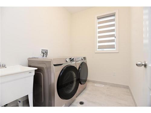 102 Rugman Crescent, Springwater, ON - Indoor Photo Showing Laundry Room