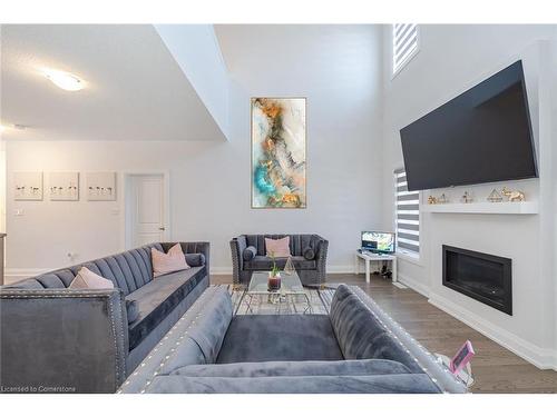 63 Jazzberry Road, Brampton, ON - Indoor Photo Showing Living Room With Fireplace