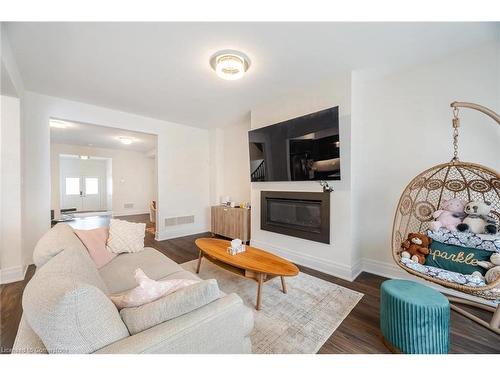 64 Macklin Street, Brantford, ON - Indoor Photo Showing Living Room With Fireplace