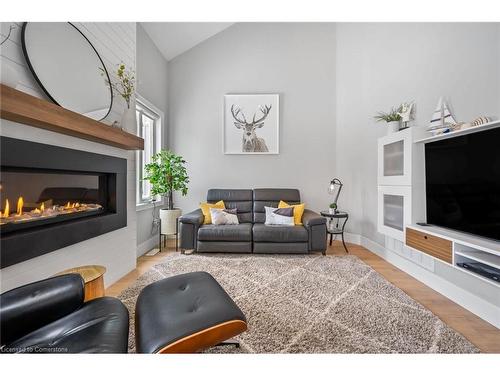 61 Sandy Coast Crescent, Wasaga Beach, ON - Indoor Photo Showing Living Room With Fireplace