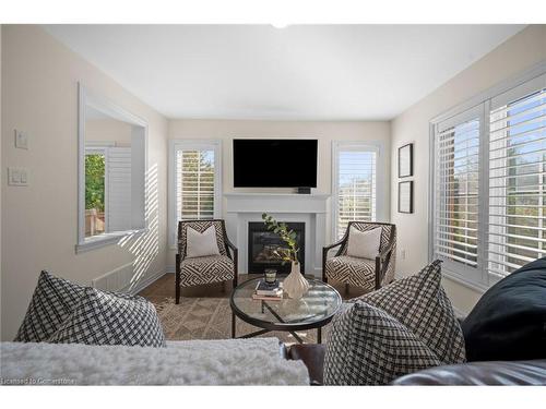 1002 Solomon Court, Milton, ON - Indoor Photo Showing Living Room With Fireplace