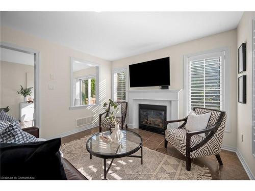 1002 Solomon Court, Milton, ON - Indoor Photo Showing Living Room With Fireplace