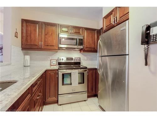 312-2177 Burnhamthorpe Road W, Mississauga, ON - Indoor Photo Showing Kitchen