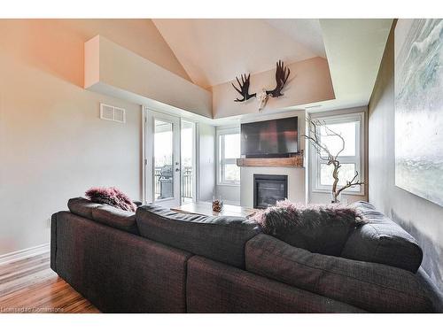 302-4 Anchorage Crescent, Collingwood, ON - Indoor Photo Showing Living Room With Fireplace