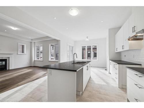 1364 Hydrangea Gardens, Oakville, ON - Indoor Photo Showing Kitchen With Fireplace With Upgraded Kitchen