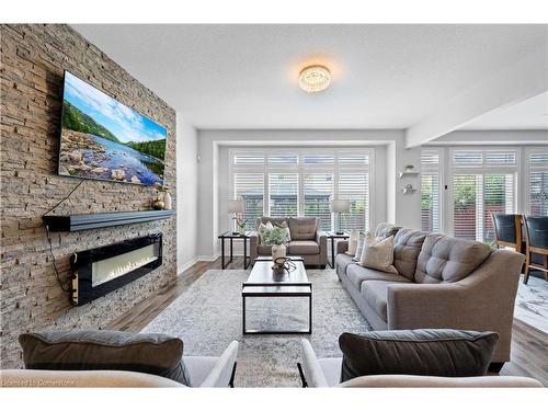 39 Weathering Heights, Stoney Creek, ON - Indoor Photo Showing Living Room With Fireplace