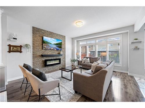 39 Weathering Heights, Stoney Creek, ON - Indoor Photo Showing Living Room With Fireplace