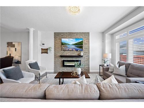 39 Weathering Heights, Stoney Creek, ON - Indoor Photo Showing Living Room With Fireplace